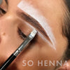 Henna brow being applied